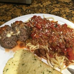 A picture of Scratch Spaghetti and Cheese Stuffed Meatballs .