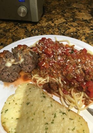 A picture of Scratch Spaghetti and Cheese Stuffed Meatballs .