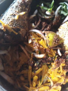 A picture of Abacha with fish.