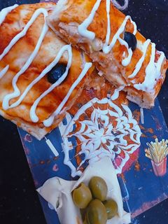 صورة لوصفة بيتزا كوفار 🍕