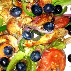 A picture of Chicken Stir-Fry Lettuce with Blueberries dressing.