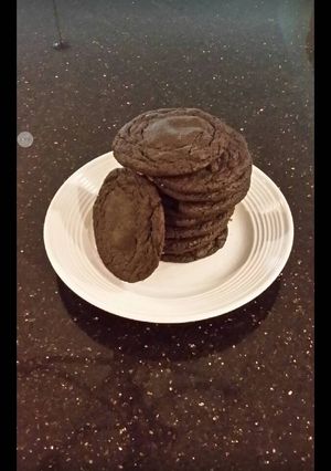 A picture of Chocolate Cookies with a White Chocolate Truffle Filled Center.