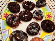 A picture of eggless donuts with milk
