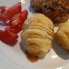 A picture of Oven Roasted Potatoes with Cheese.