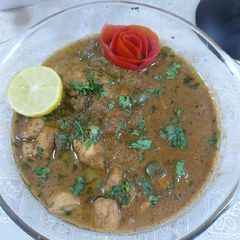 A picture of Lemon pepper chicken with gravy.