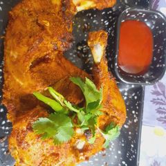 A picture of Roasted chicken leg 🍗peice.