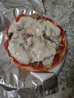 A picture of Pepperoni pizza pita wrap.