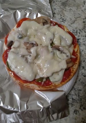 A picture of Pepperoni pizza pita wrap.