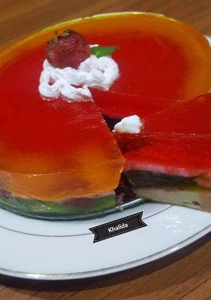 A picture of Rainbow tri jello upside down pudding cake.