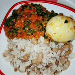 A picture of Rice and Beans with peppered veggies.