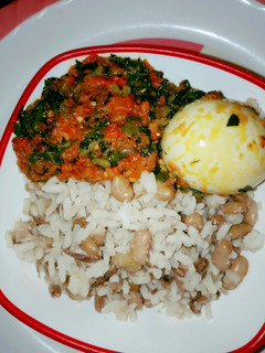 A picture of Rice and Beans with peppered veggies.