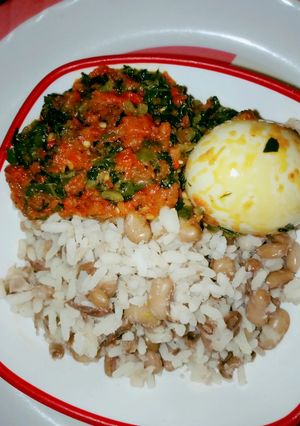 A picture of Rice and Beans with peppered veggies.