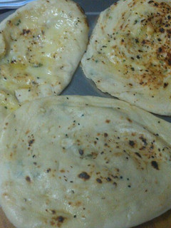 A picture of Cheese Filled Garlic Naan Bread.