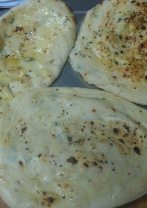 A picture of Cheese Filled Garlic Naan Bread.