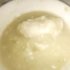 A picture of Potato & Leek Soup with frozen pork Gyozas.