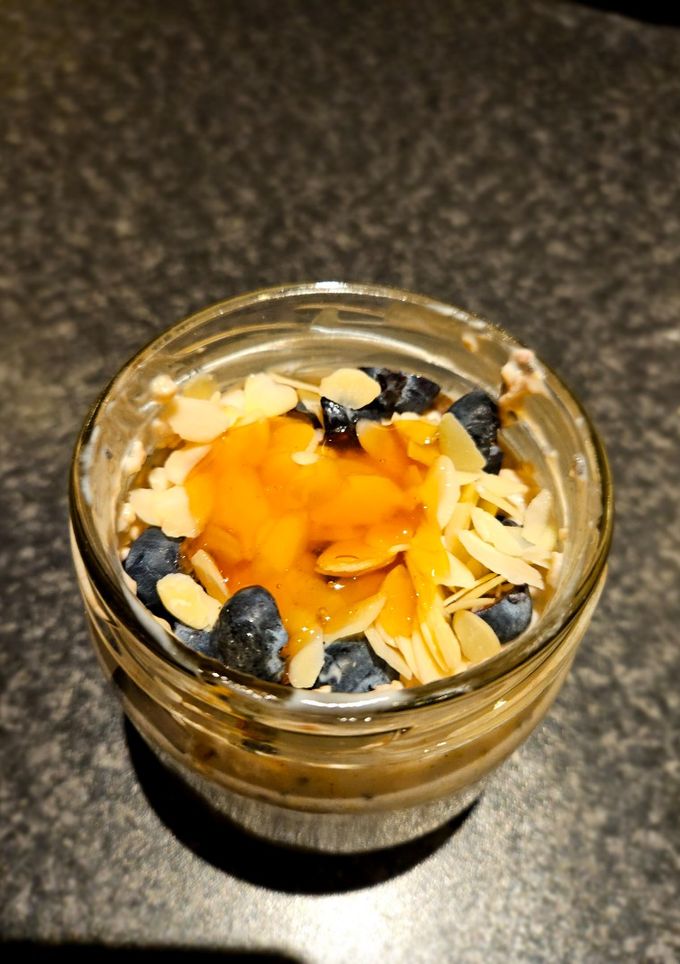 A picture of Honey and almond flakes overnight oats.