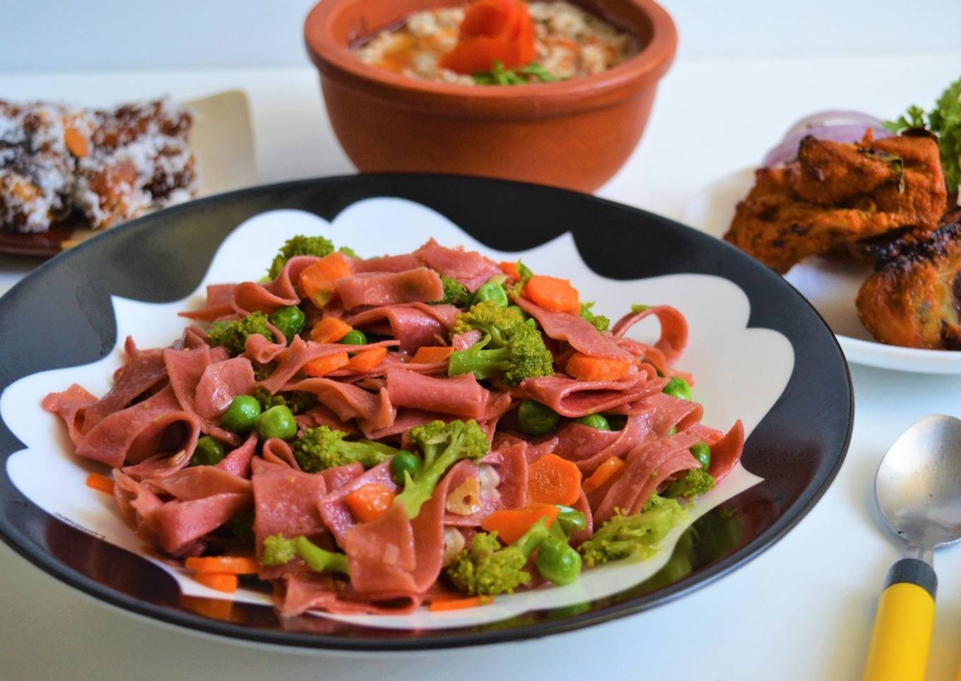 Wholewheat beetroot pasta with stir fried vegetables