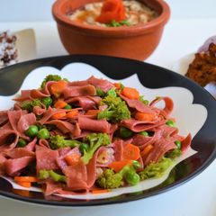 A picture of Wholewheat beetroot pasta with  stir fried vegetables.
