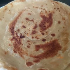 A picture of Coconut cream beans and soft layared carrot chapatis.