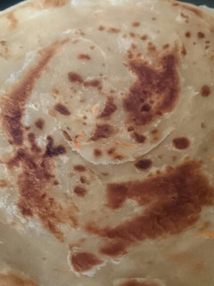 A picture of Coconut cream beans and soft layared carrot chapatis.
