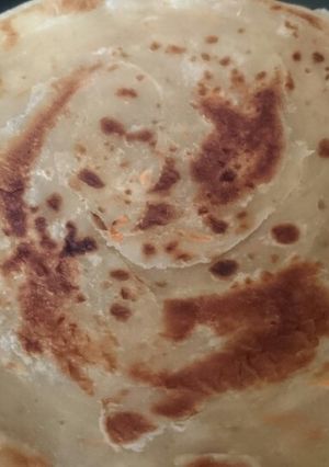 A picture of Coconut cream beans and soft layared carrot chapatis.