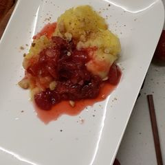 Pineapple sorbet with strawberry compote A picture of Pineapple sorbet with strawberry compote.