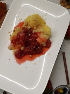 A picture of Pineapple sorbet with strawberry compote.