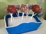 Una foto de cake pops chocolate