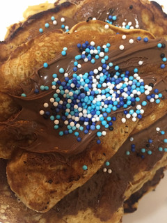Una foto de Tortitas o pancakes con nutella