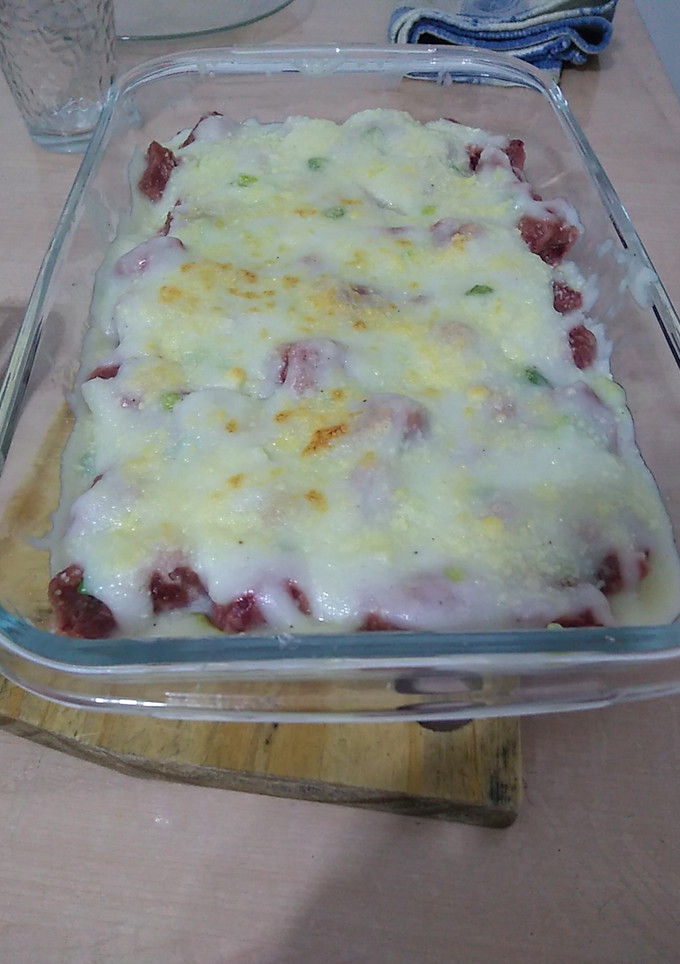 Una foto de Ñoquis de remolacha con salsa blanca