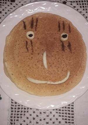 Una foto de Enormes panquques de carita para mamá