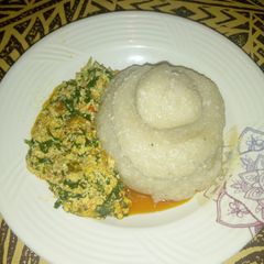 Eba and Egusi stew with minced Fish A picture of Eba and Egusi stew with minced Fish.