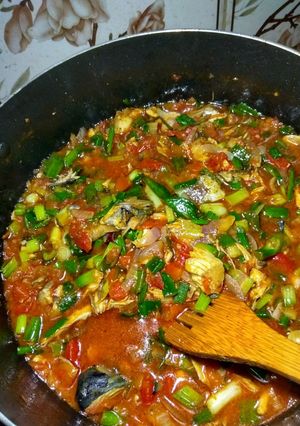 A picture of Fish and tomatoes sauce.