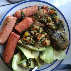 A picture of Low carb vegetable, sausages,avocado and fish.