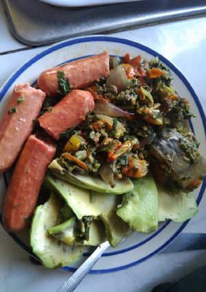 A picture of Low carb vegetable, sausages,avocado and fish.