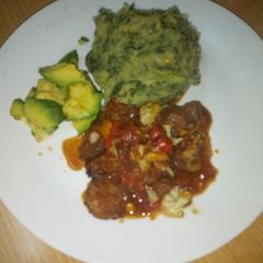 A picture of Mukimo served with beed stew and some avocado 😋.