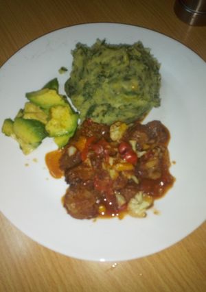 A picture of Mukimo served with beed stew and some avocado 😋.