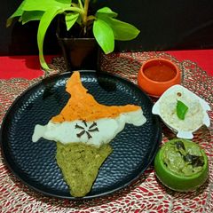 A picture of Tricolour Dosa with Tricolour Chutney.