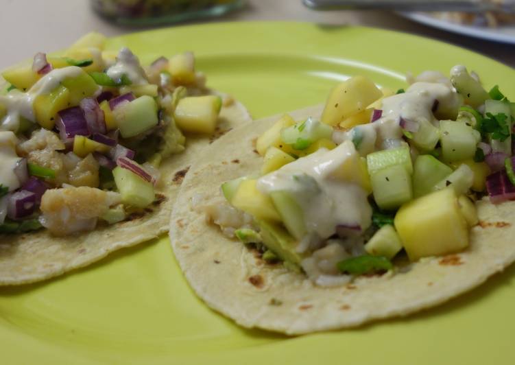 Fish tacos with mango salsa and yoghurt-lime sauce