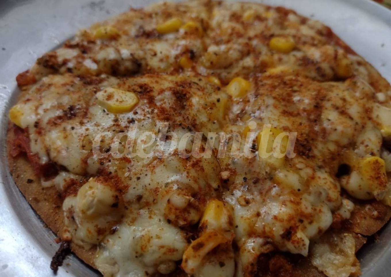 Whole wheat thin crust cheese corn pizza