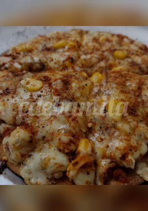 A picture of Whole wheat thin crust cheese corn pizza.