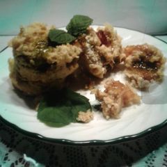A picture of Mug Muffins with gummy bears.
