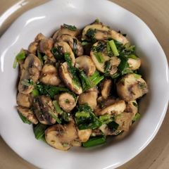 Mushrooms with green onions and parsley A picture of Mushrooms with green onions and parsley.