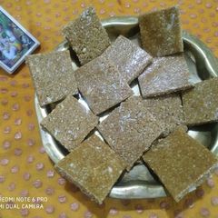 Ground Til Coconut Mix Chikki A picture of Ground Til Coconut Mix Chikki.