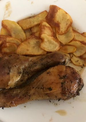 Una foto de Muslos de pollo al horno