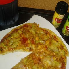 A picture of ChickenTikka Pizza.