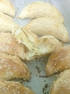 Una foto de Empanadas de queso y cebolla