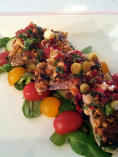 A picture of Tuna Steak with a sweet chilli sauce.