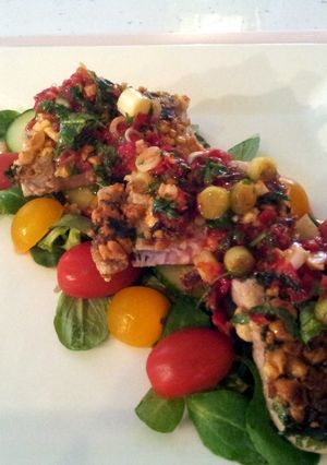 A picture of Tuna Steak with a sweet chilli sauce.