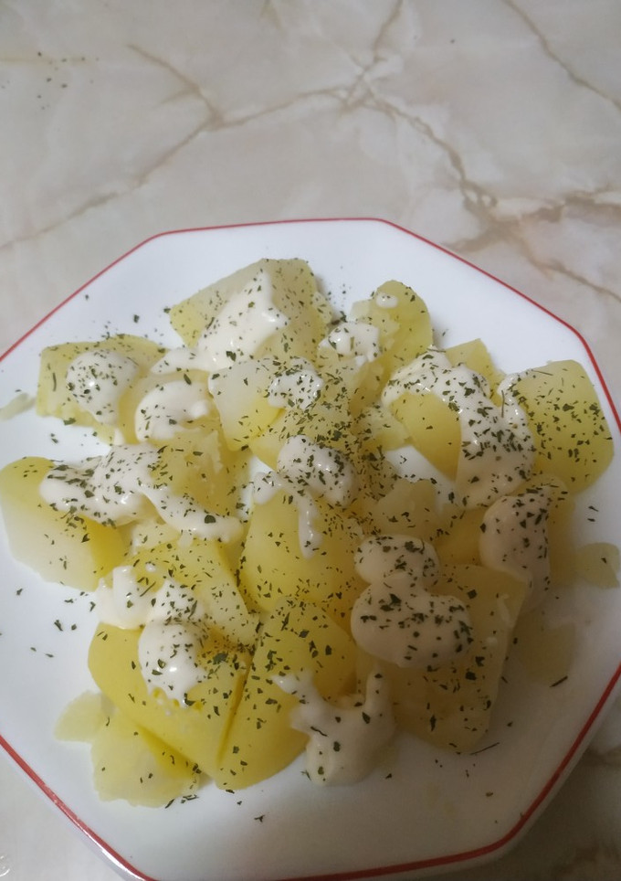 Una foto de Patatas con alioli